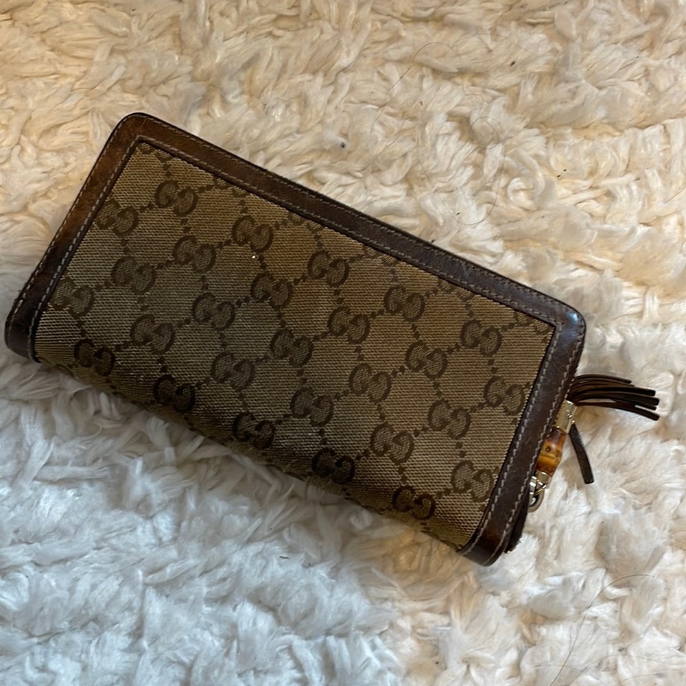 Gucci wrap around zipper wallet